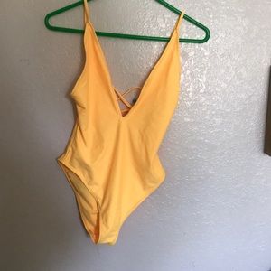 Plunging bright yellow one piece